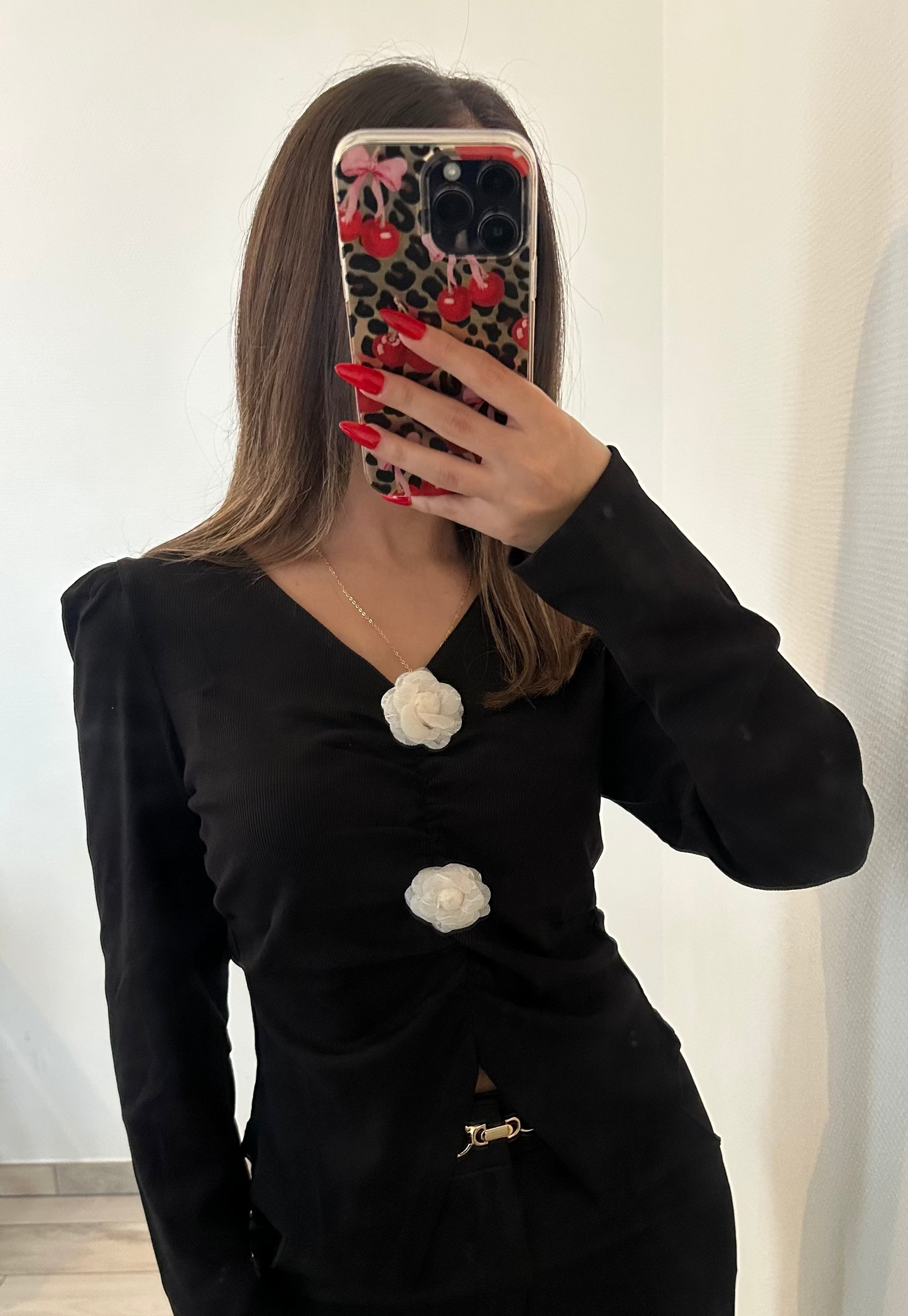 Pull fleuri à manches longues